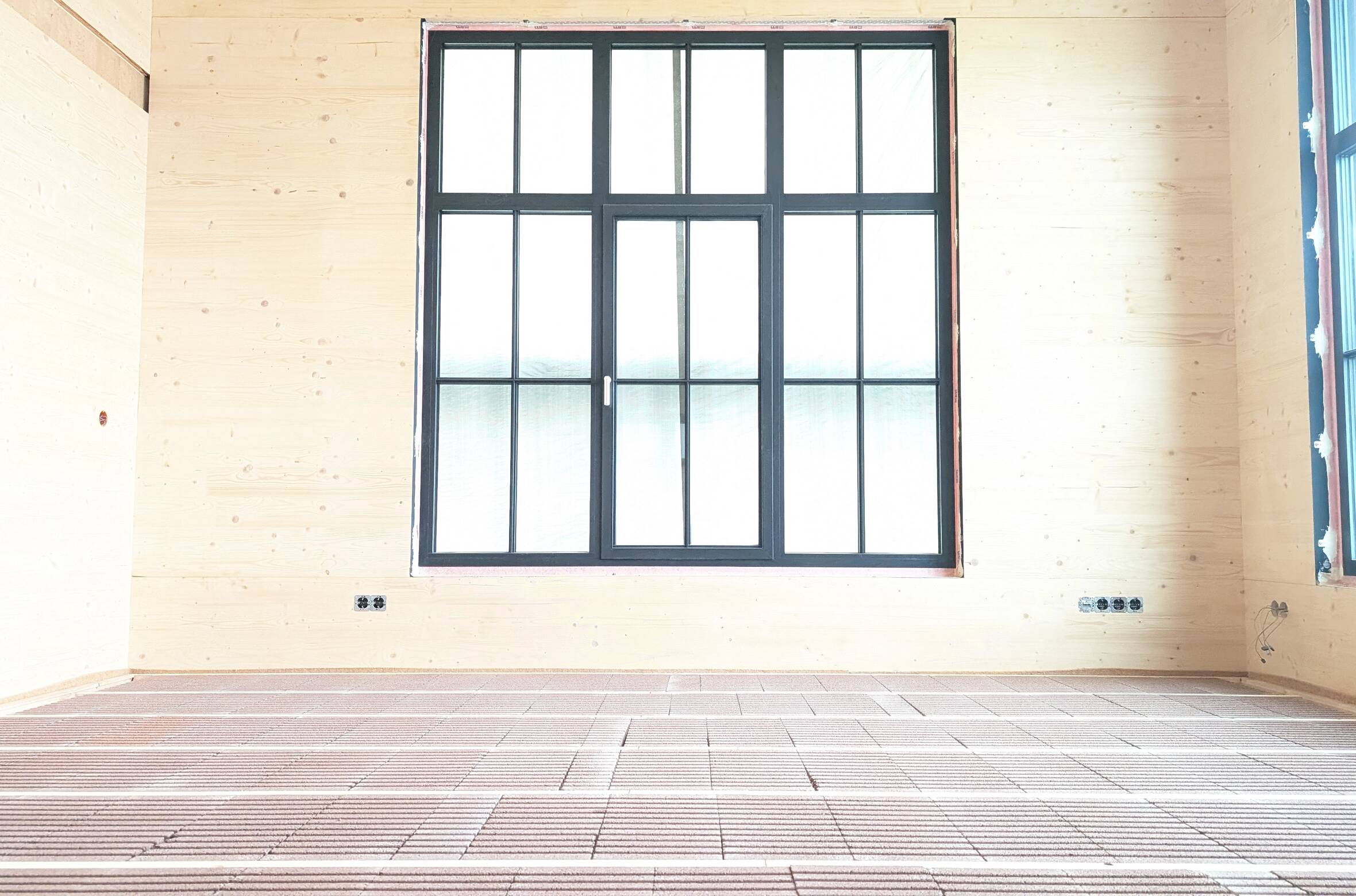 Lithotherm_Fußbodenheizung_in_Holzhaus